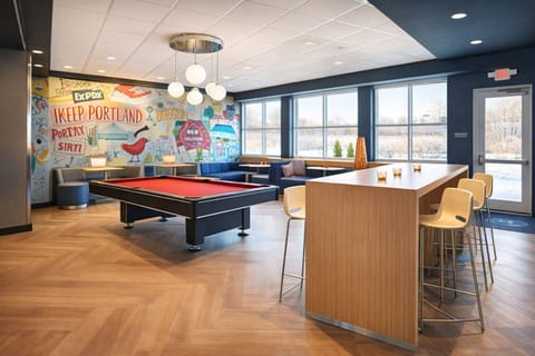 Gather for friendly competition with pool table and lounge vibes.