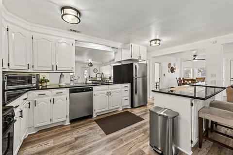 Kitchen with stainless steel appliances and drip coffee maker