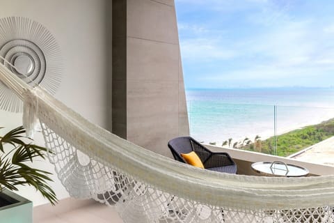 your private balcony with a hammock and a view