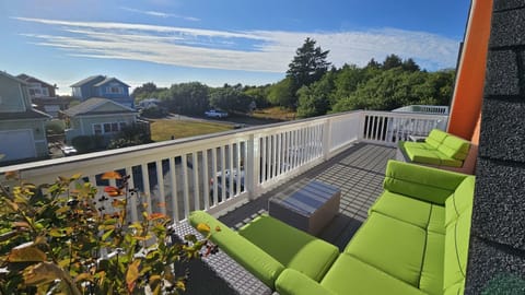 Sunbathe on the upper deck as the ocean roars below the bluff