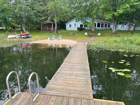 8x8 platform for jumping into the lake. 50 ft x 4 ft wide floating dock. Sandy bottom in swim area.