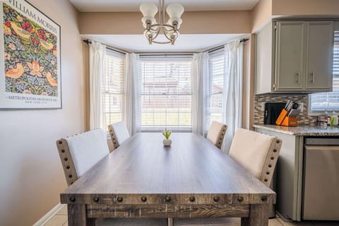 "Bright and inviting dining area with ample seating."