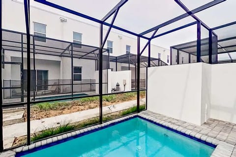 Enjoy sunny days and relaxing swims in your private pool surrounded by a clean, open deck — perfect for family fun.