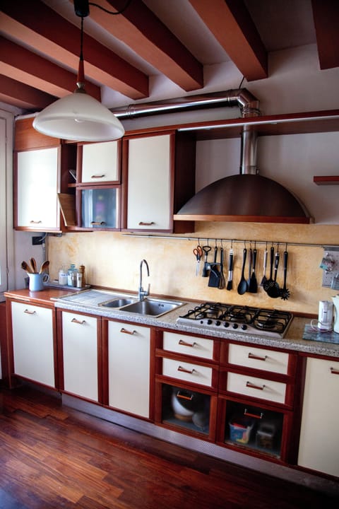 open plan kitchen and dining room with large fridge and large freezer