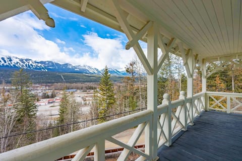 Take a moment on the balcony to soak in the crisp air and marvel at the majestic mountain peaks in the distance.
