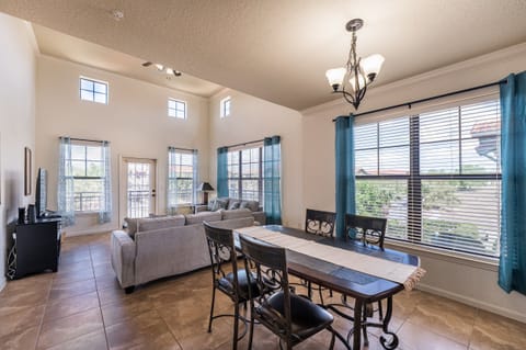 Beautiful city style condo with extra high ceilings providing ambient lighting and adds to the spacious feel.