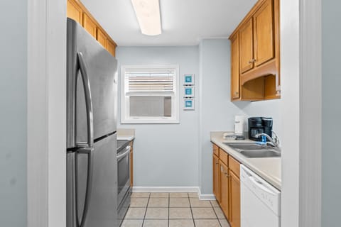 Fully Stocked Kitchen with Bar Seating