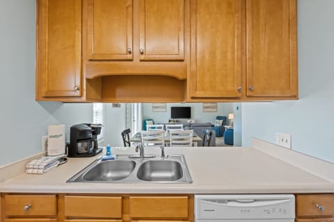 Fully Stocked Kitchen with Bar Seating