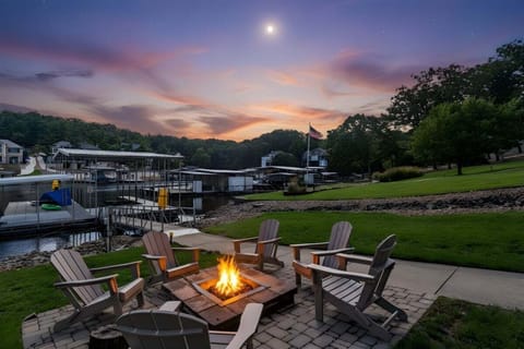 Live that lake life and enjoy your day on the concrete cruiser dock, complete with lounge seating, swim deck, gentle lake steps, swim mat, kayaks and a 16x44 boat slip.