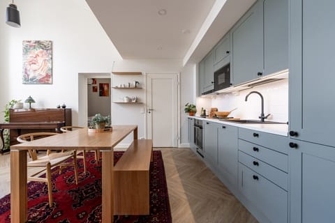 Enjoy a cup of coffee while chatting with your family or friends at the kitchen table.