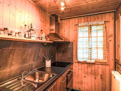 Wood, Ceiling, Floor, Flooring, Wood Stain, Hardwood, Room, Light Fixture, Log Cabin, Kitchen