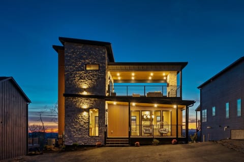 This stunning home invites you to unwind in style, with a spacious deck and an expansive balcony perfect for soaking in the fresh air, savoring morning coffee, or hosting unforgettable gatherings under the stars. 