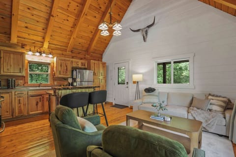 BIG CABIN - "A-frame interior design of the big cabin with open concept living and walkout access to the deck."