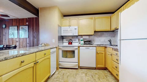 The inviting kitchen offers ample space & every home comfort