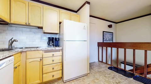The inviting kitchen offers ample space & every home comfort