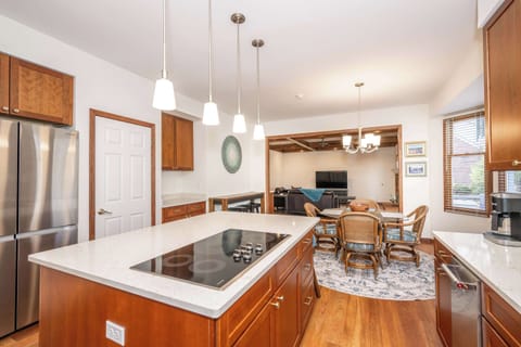 The chic, open kitchen offers ample space & every home comfort