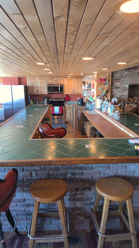 The downstairs kitchen and original 36ft brick bar