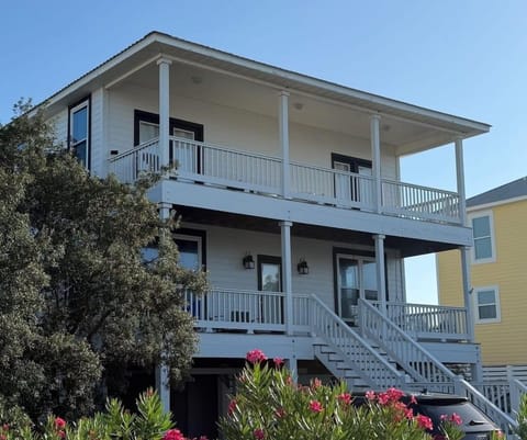 Beach Revival. Ft. Morgan, AL. Beach House. 3BR 2.5BA. Sleeps 12. Managed by Island Rentals.