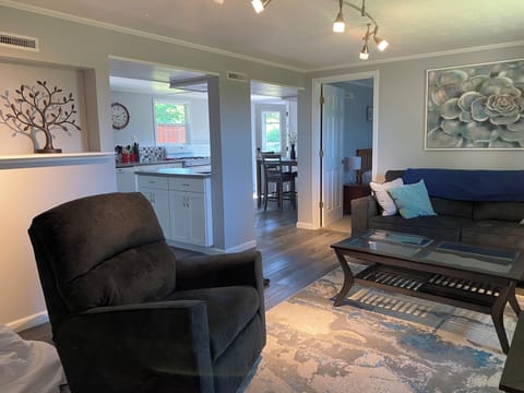 Open plan kitchen, dining and living rooms. 