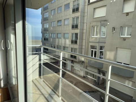 Balcony with sea views and morning sunlight.