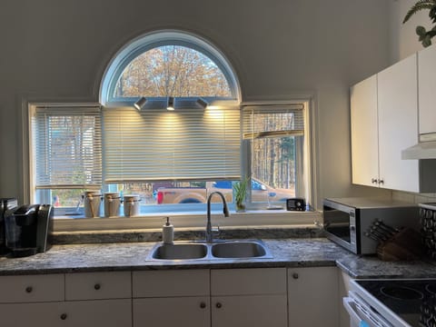 Our South-facing kitchen window captures wonderful sunlight.