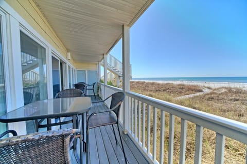 Unwind on your private deck just steps from the sand and sea breeze.