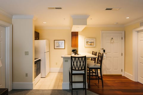 A well-equipped kitchen and dining space provide the perfect balance of convenience and charm.