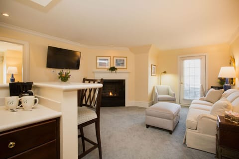 Cozy and inviting, this suite features a warm fireplace and an open layout for ultimate relaxation.
