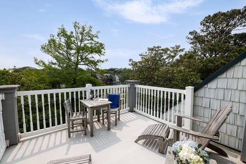 Breathtaking views and cozy seating make this private balcony an ideal spot to soak in the serenity.