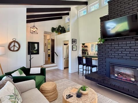 Living room: *Smart TV w/soundbar *Comfy seating *Electric fireplace *Blankets