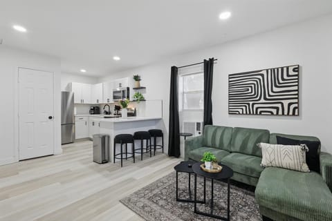 “Modern Comfort with Style”
Cozy up on the stylish sectional, cook in the fully equipped kitchen, or enjoy a meal at the bar.