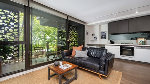 Light and bright living space leading out to the balcony 