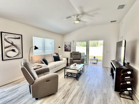 Cozy Living Room with large flat screen TV