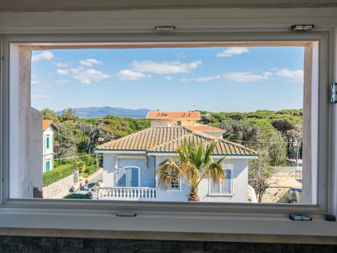 Furniture, Wood, Interior Design, Flooring, Kitchen, Cabinetry, Floor, Room, Major Appliance, Cupboard