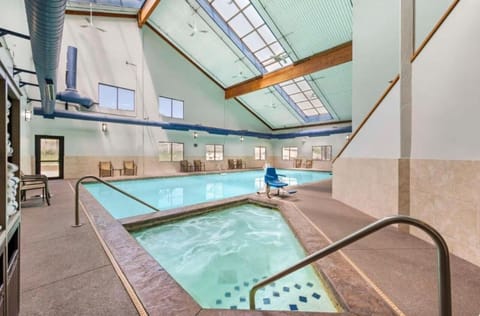 Dive into bright indoor pool, then unwind in soothing whirlpool.