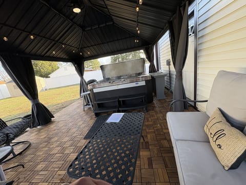 Indoors, Outdoors, Shelter, Floor, Chair