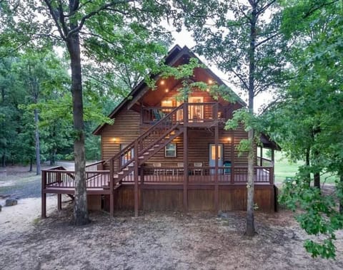 Wake up to rolling hills, fresh air, and the perfect golf course view from this dream cabin!