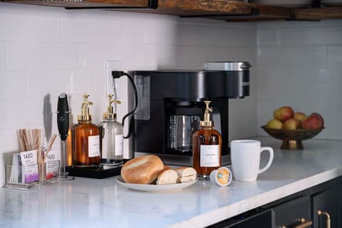 Start your day right with a cup of joe from our cozy coffee bar - where every sip is a treat for your taste buds!