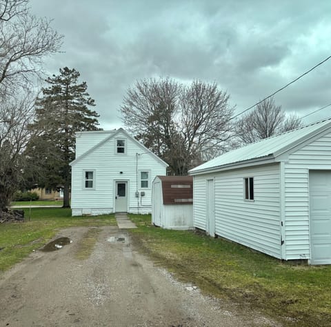 Rear of home accessible via the alley. Garage is not open to guests.