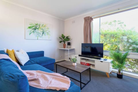 Bright and Spacious Open-plan Living Area with Comfy Sofa