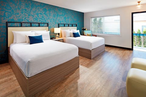 Unit with 2 Queen beds. Exact unit will be assigned upon arrival. Views, colors, and decor may vary.