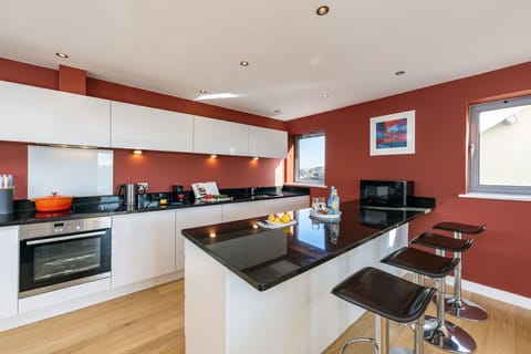 14 Azure, Newquay: Including an electric oven, grill and hob, microwave, fridge/freezer, dishwasher, Nespresso coffee machine and breakfast bar