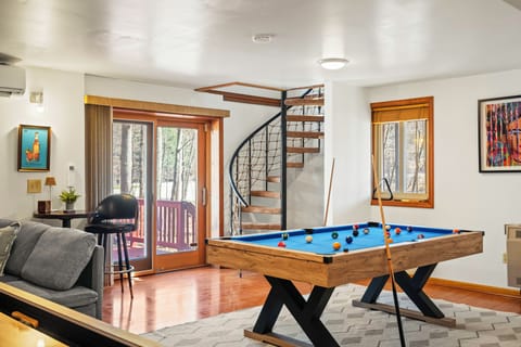 Challenge friends and family to a game on the pool table—perfect for fun and friendly competition!