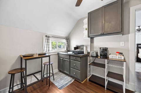 Kitchenette: Efficient & Stylish – A modern kitchenette for easy meal prep.