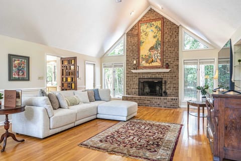 Spacious Living Room with Cozy Seating & Natural Light