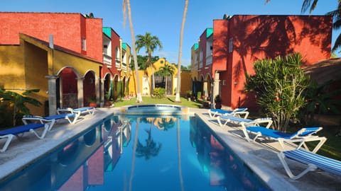 An afternoon photo of vibrant Mexican Colonial architecture.