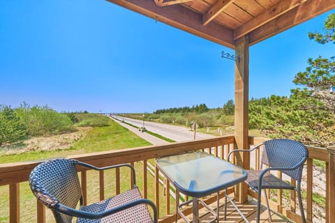 Enjoy unobstructed ocean views from the private balcony, complete with a table and two chairs—perfect for relaxing with a drink and watching the sunset.
