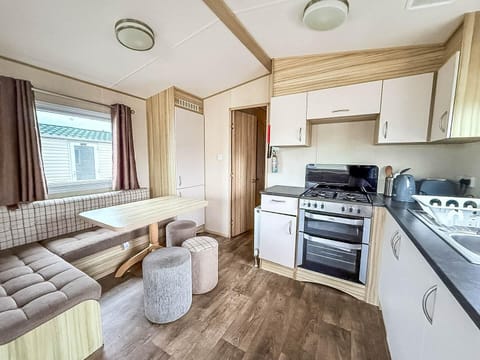 Cozy kitchen and dining nook with ample natural light