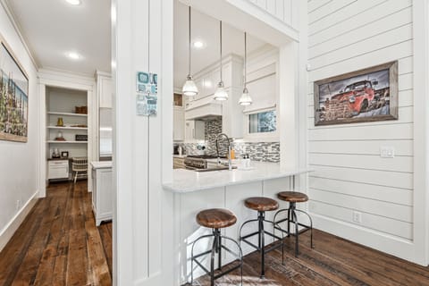 Belly on up to the bar for a drink, snack, or work station....