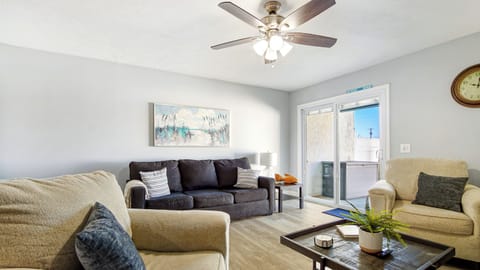 Lower Level: Coastal decor in serene beach color scheme for relaxation.